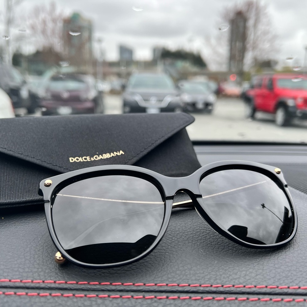 Dolce and Gabbana black and gold sunglassess